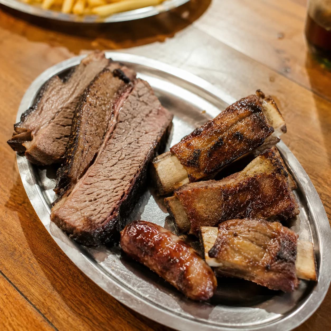 Parrilla con carnes y achuras